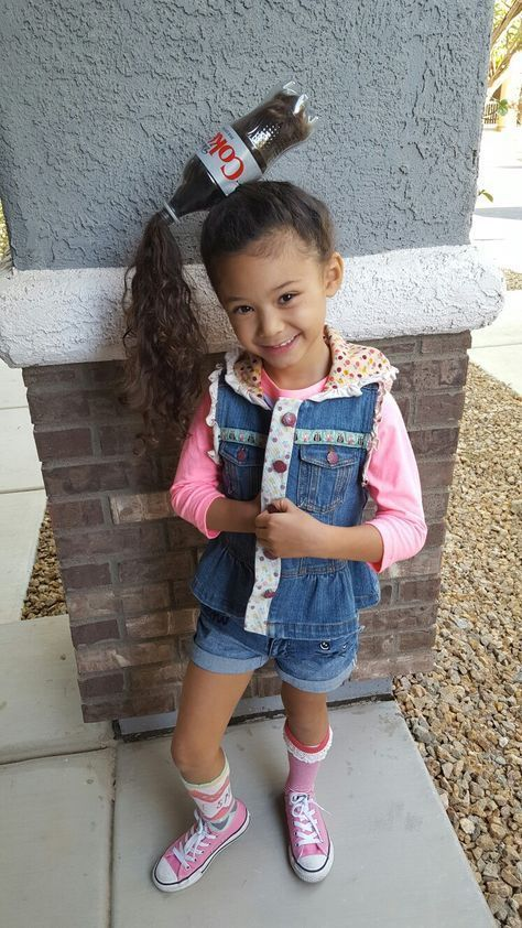 Picture of  a girl rocking a coke hairdo for the event