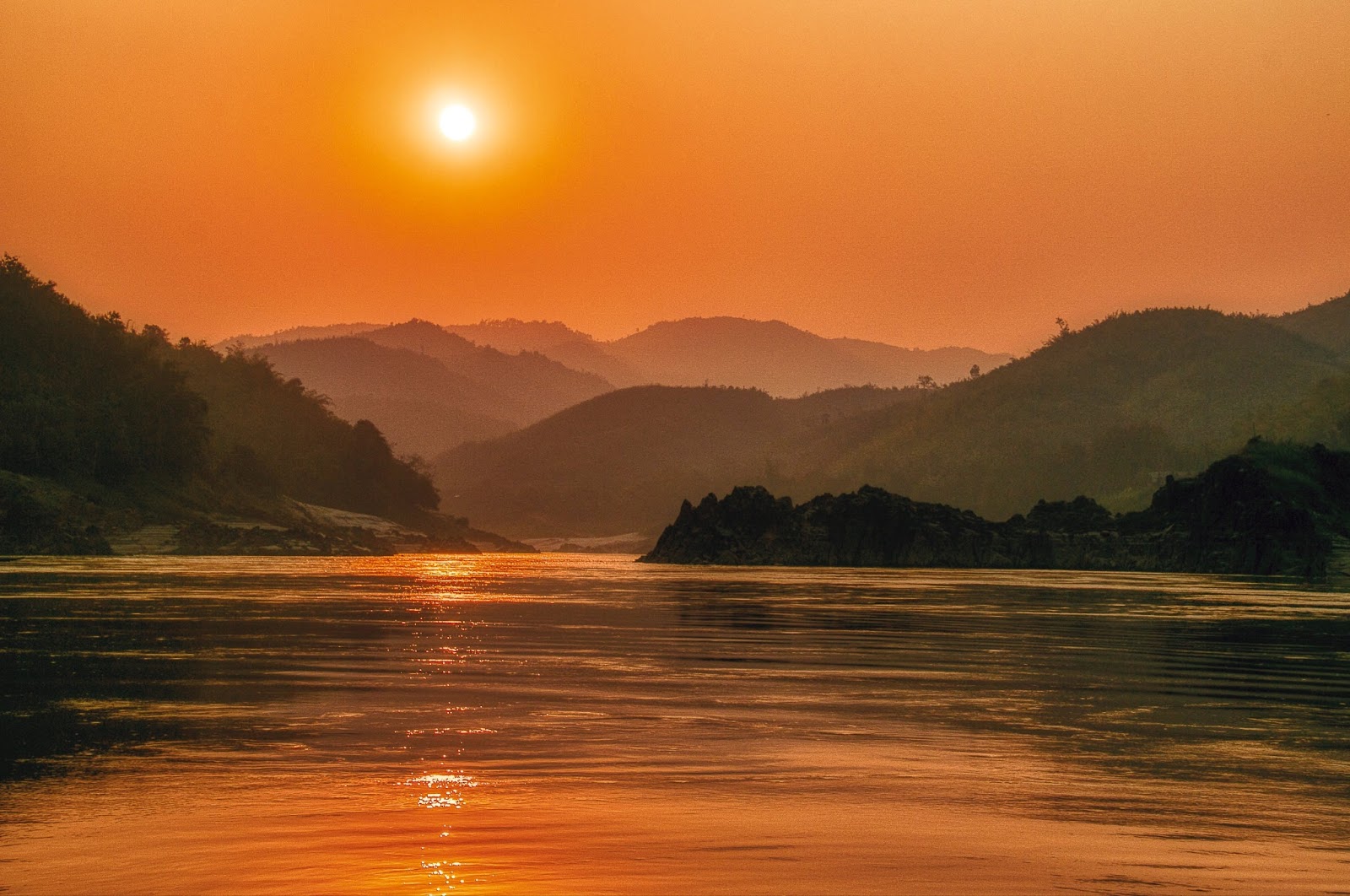 A stunning sunset over the Mekong River. 