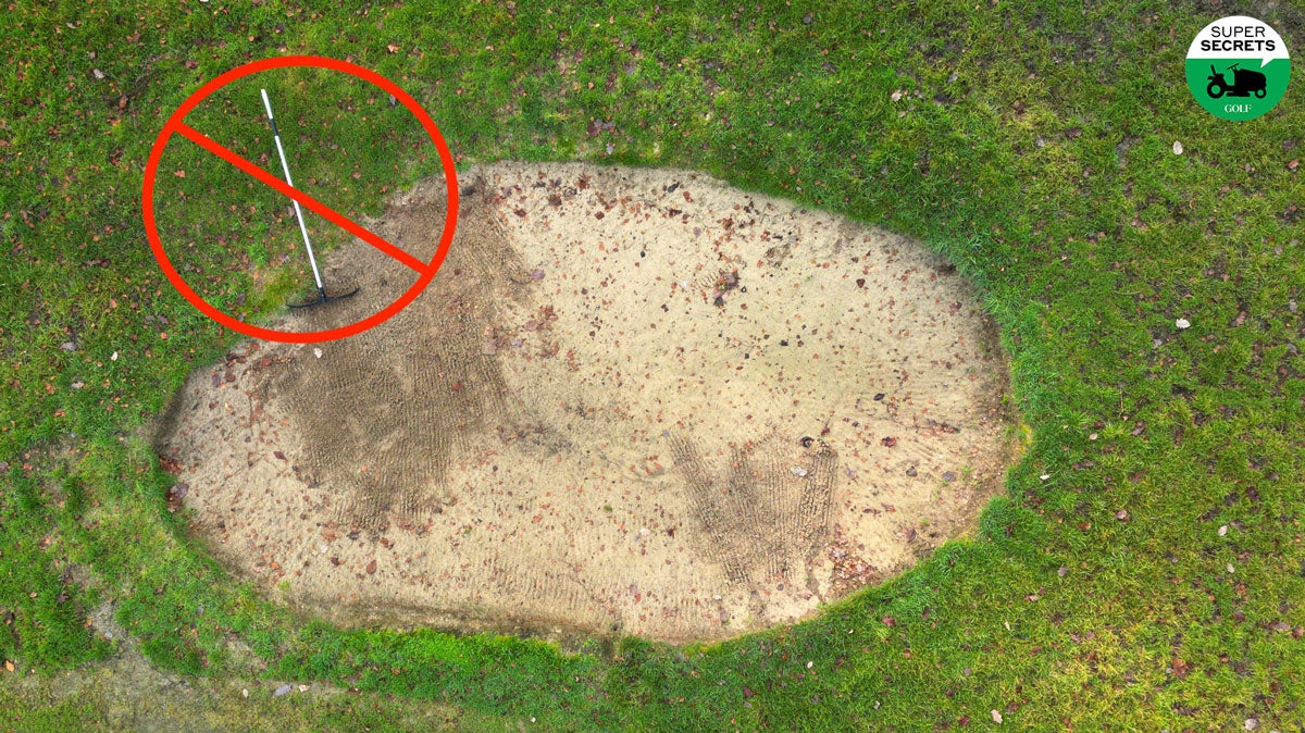 bunker rake in bad position next to a bunker