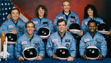 A group of astronauts posing for a photo<br /><br />Description automatically generated