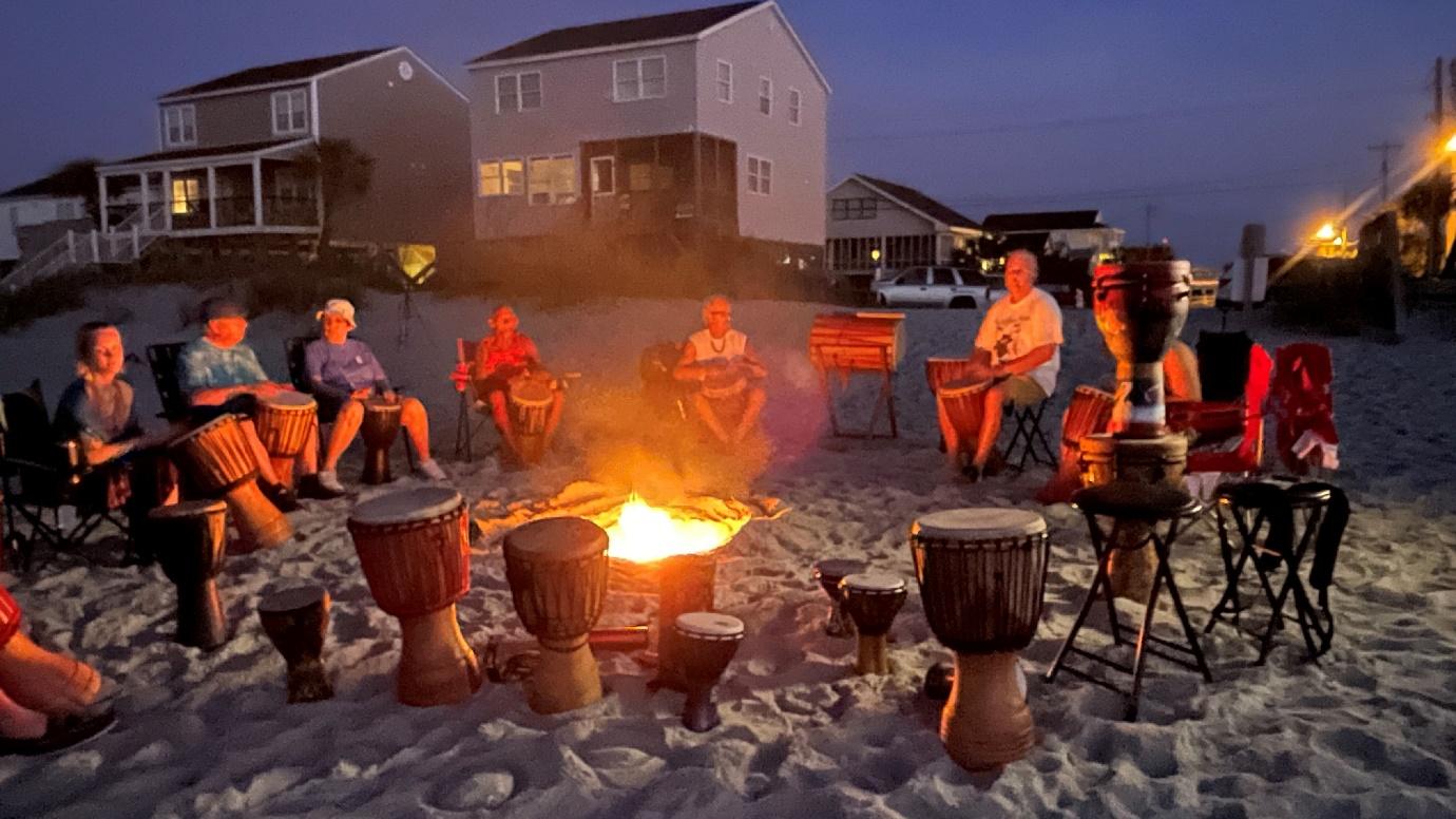 Sunset drum circles on the beach happen weekly in Garden City and North  Myrtle Beach
