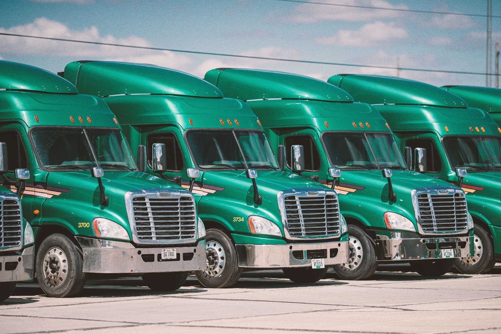 Different types of semi trucks in a row