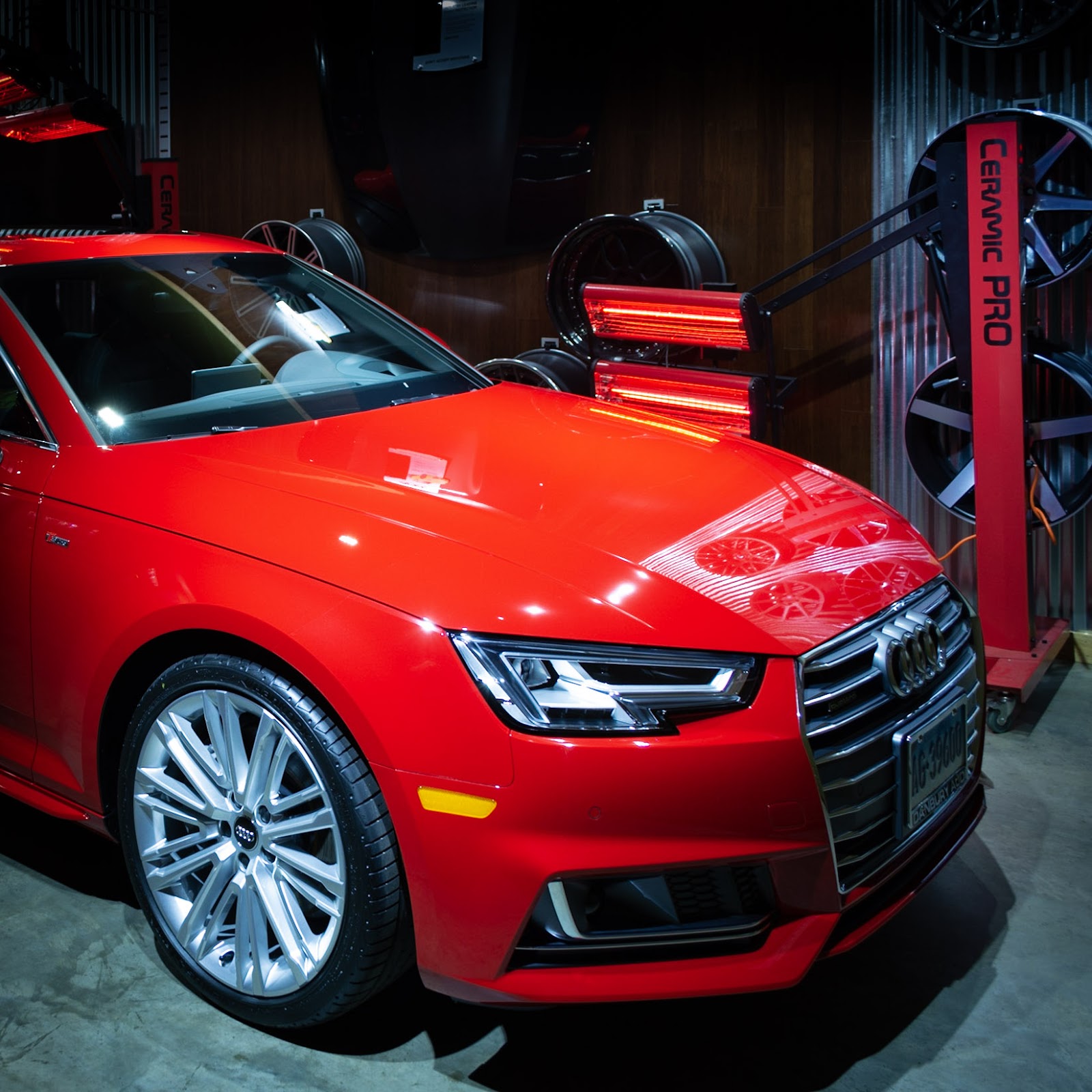 Car ceramic coating provides impeccable shine on this red Audi sedan