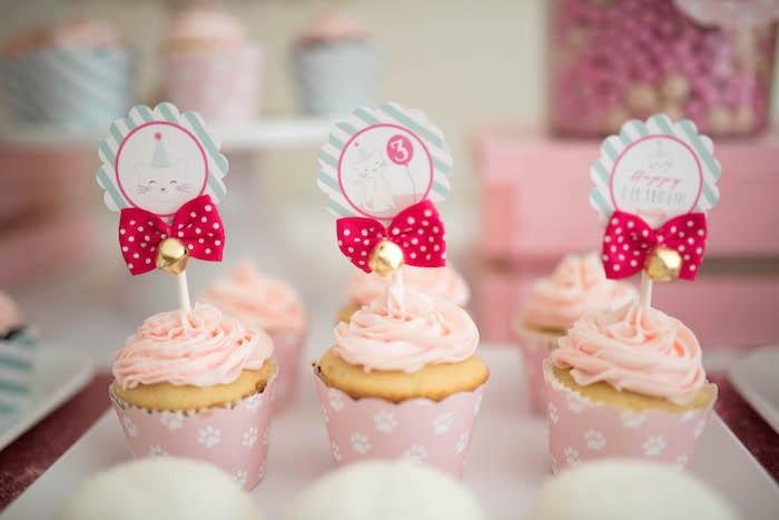 Cupcakes adorned with bows and bells from a Kitty Cat Birthday Party on Kara's Party Ideas | KarasPartyIdeas.com (23)
