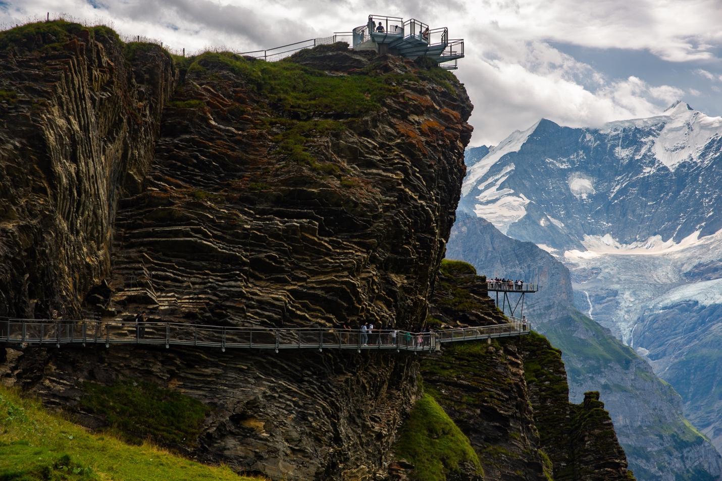 A bridge over a cliff

Description automatically generated