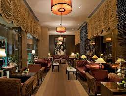 A picture containing indoor, ceiling, room, furniture

Description automatically generated