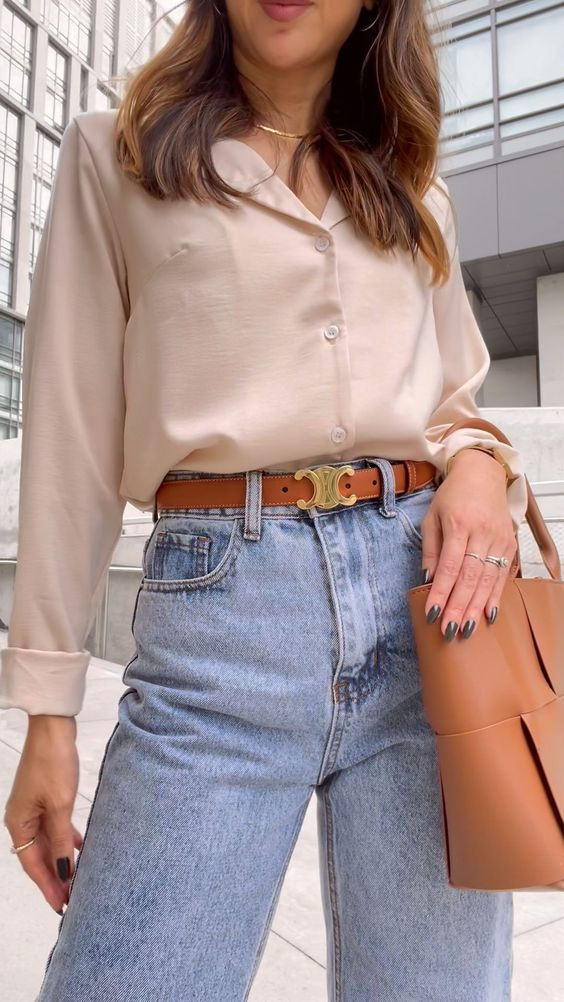 Picture of a woman rocking the celine belt with denim