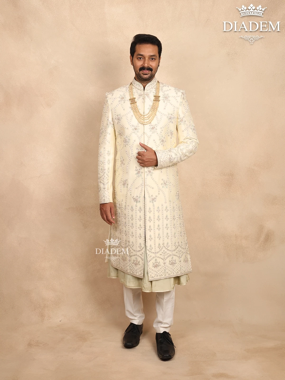Ivory Raw Silk Sherwani with Floral Threadwork Embroidery, Paired with Bead Mala