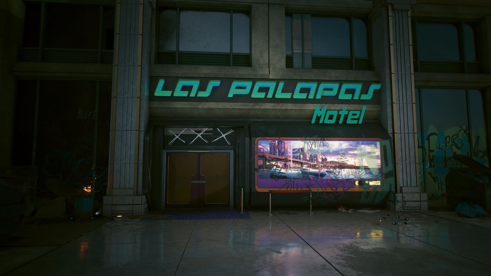 An in-game screenshot of the Las Palapas motel from the game Cyberpunk 2077