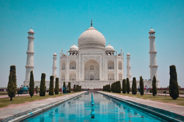 A front view of the taj mahal exemplifying the symmetry and balance