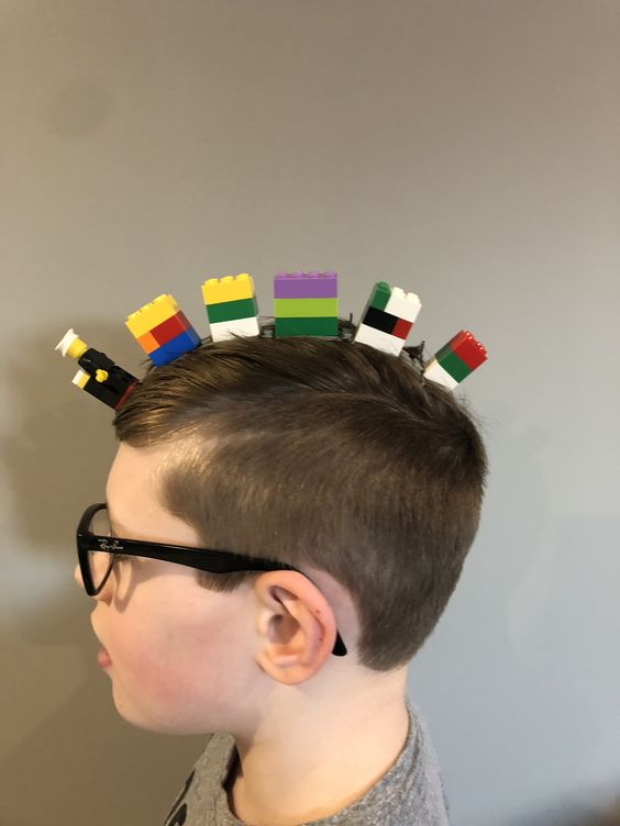 Picture showing a boy rocking a cool toy on his head for   the event
