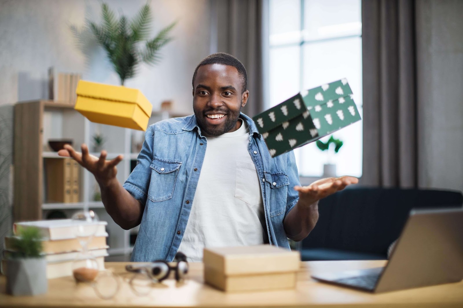 african influencer taking fun while unboxing gift