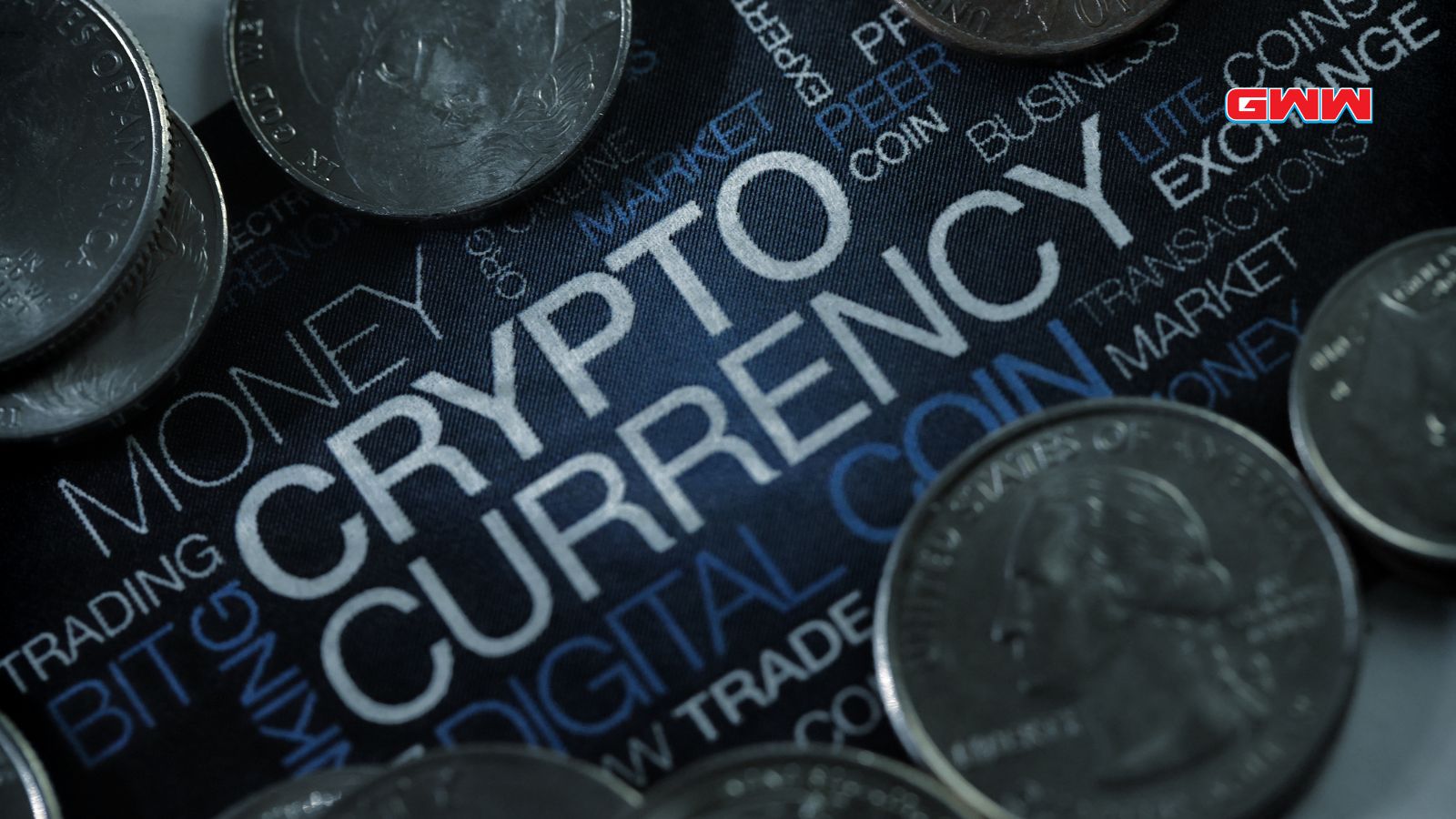 Silver coins on crypto terms fabric background