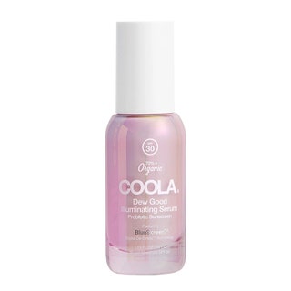 Coola Dew Good Illuminating Serum Sunscreen SPF 30 pink bottle with white cap on white background