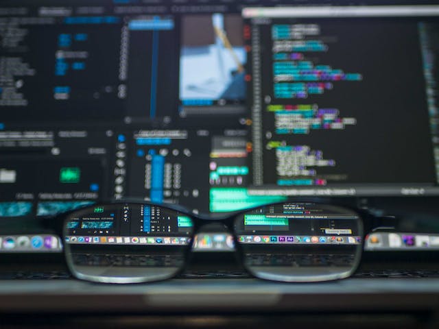 A pair of glasses on a laptop