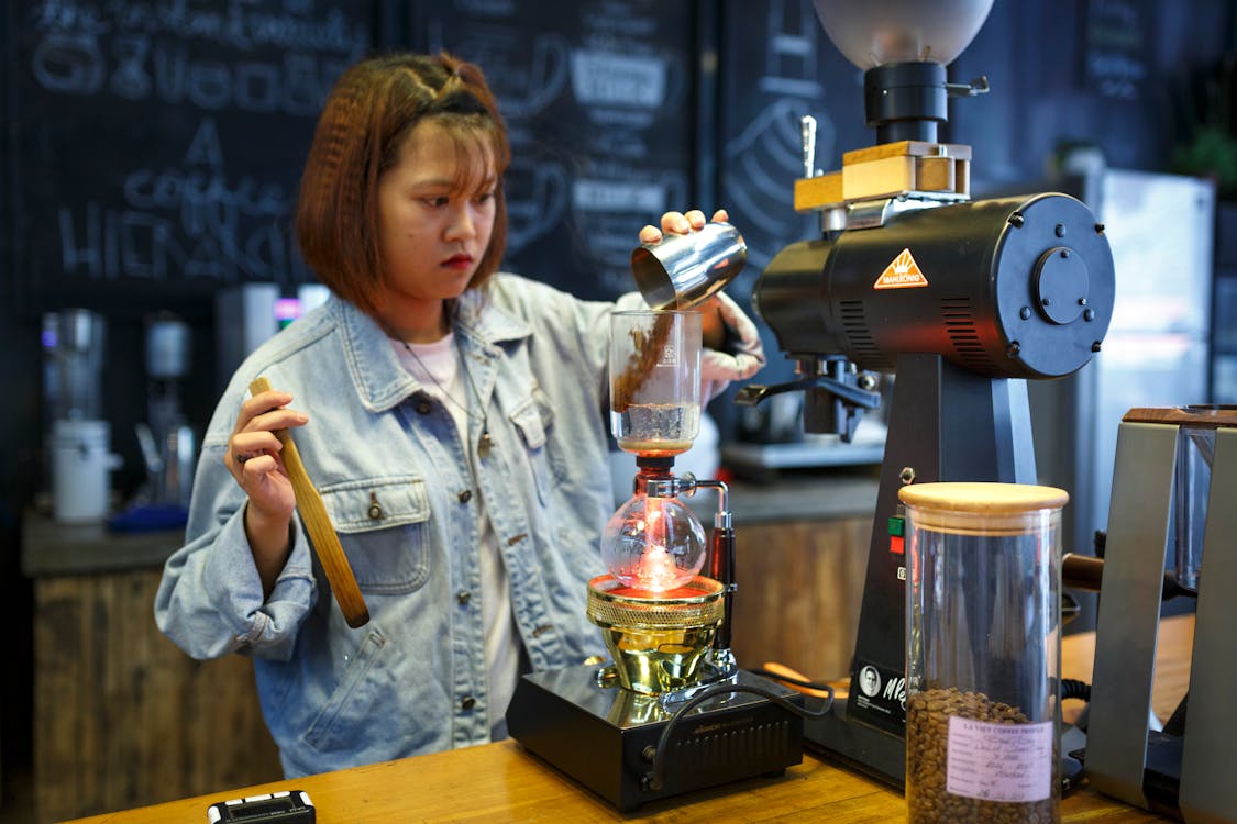 Free Woman Mixing Beverages Stock Photo