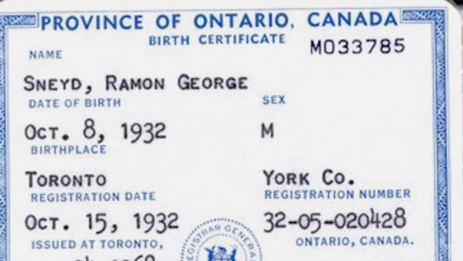 A close-up of a birth certificate

Description automatically generated