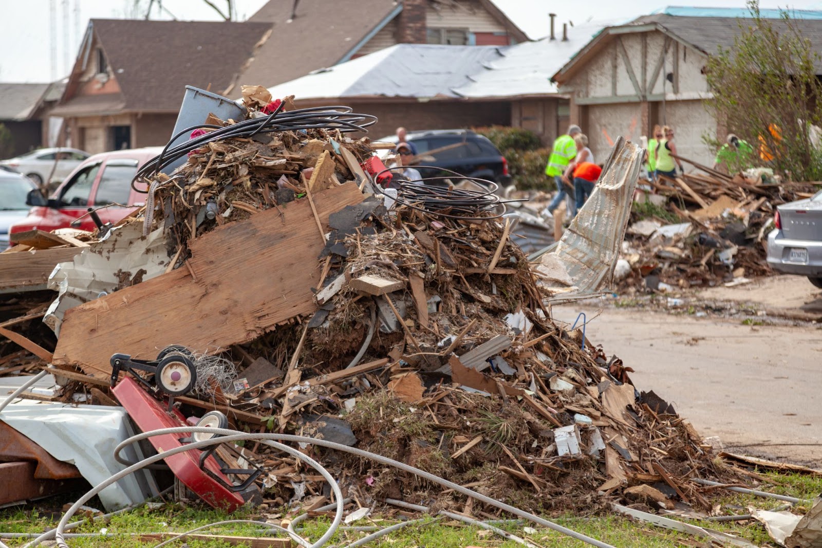 A pile of debris in a residential area, with remnants of Bowling Alley Food scattered around.