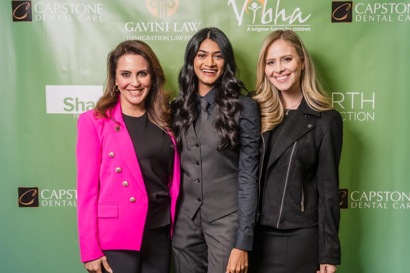 A group of women posing for a photo

Description automatically generated