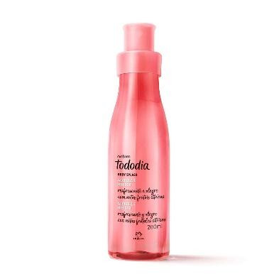 A pink bottle with a black label

Description automatically generated