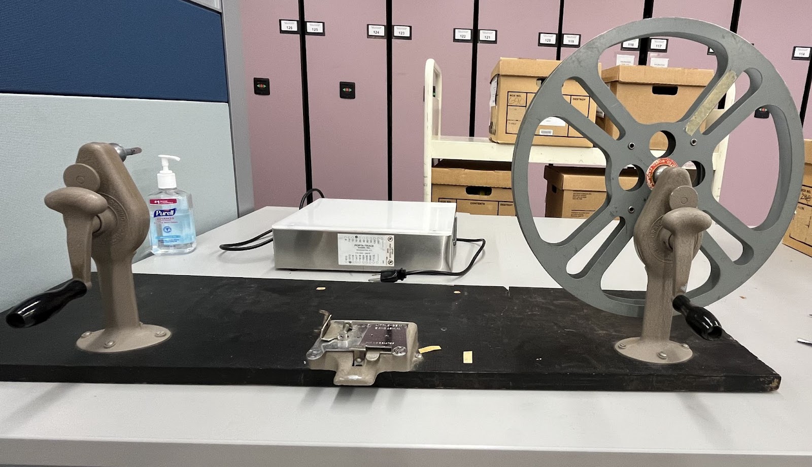 Film rewinder and lightbox on a table