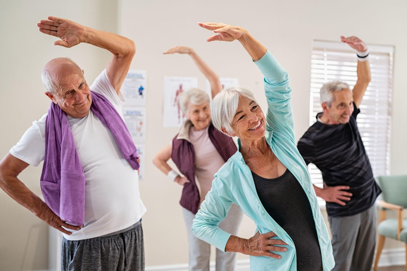 Seniors enjoy a fitness class in an assisted living community