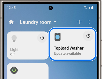 A Galaxy phone with the SmartThings app open and highlighting the Topload Washer card.