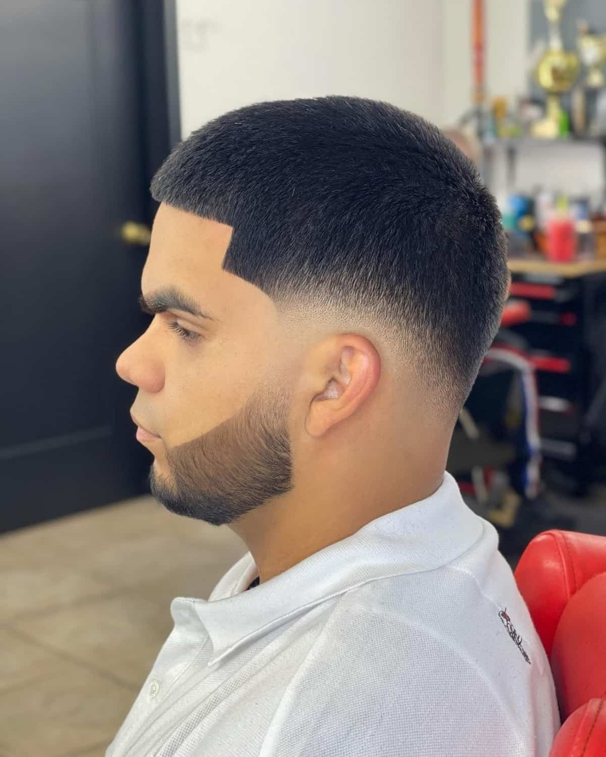 Military haircut: Picture of a man rocking the beard faded taper