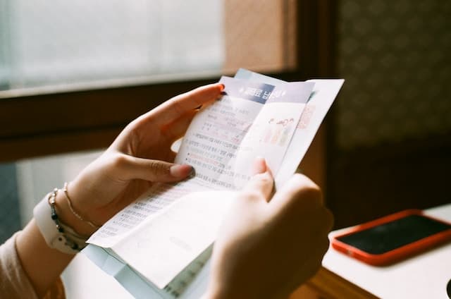 person holding a medical bill