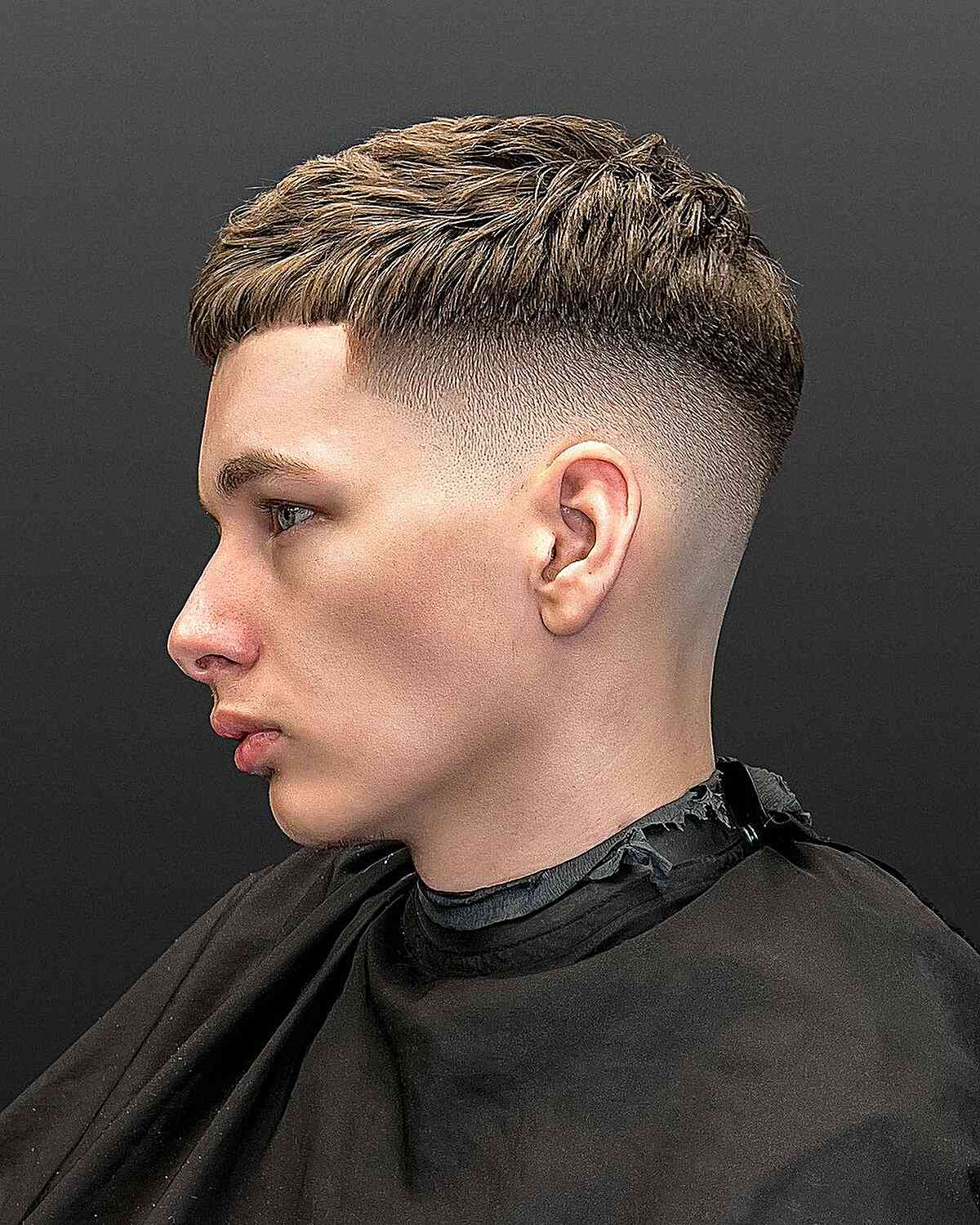 Picture showing a guy rocking the look with textured bangs
