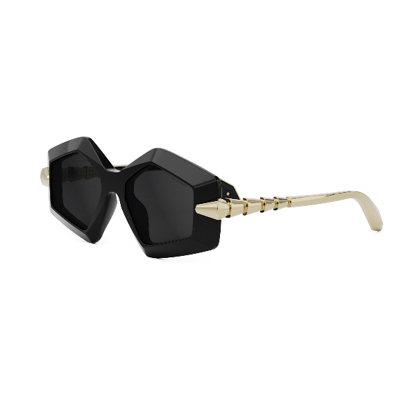 A black sunglasses with gold spikes

Description automatically generated