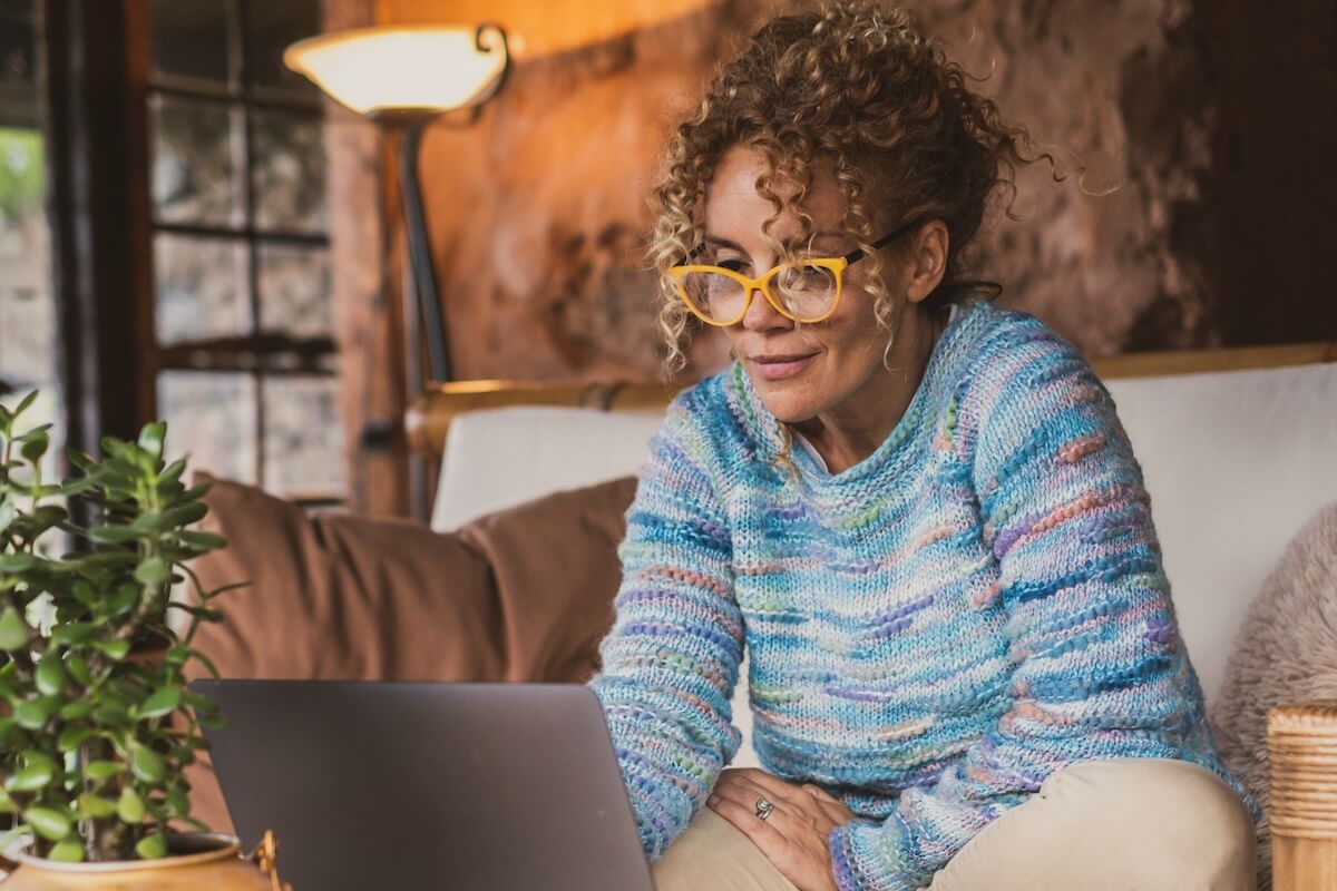 Referrals for mental health services: woman using a laptop