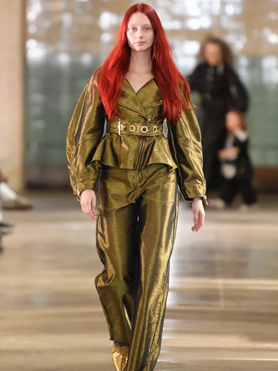 Picture of amodel dressesd in a gold outfit for Marquies  Almeida