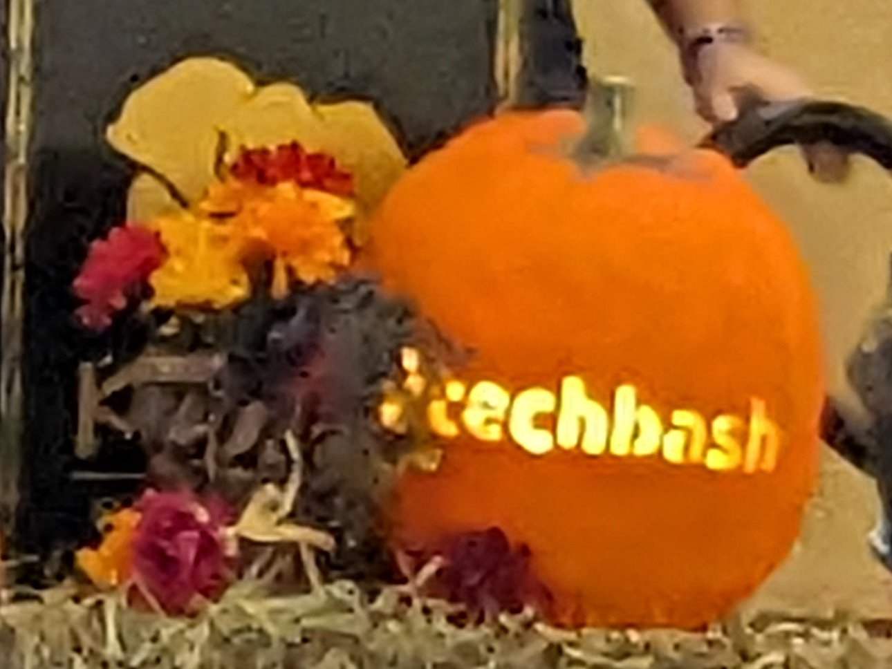 the word #techbash carved into a pumpkin