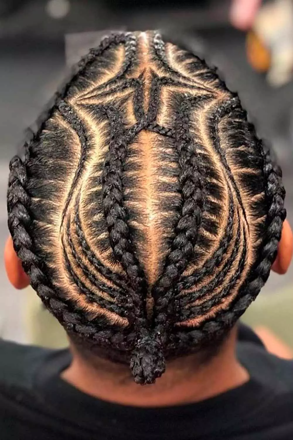 Picture of a guy rocking a nice cornrow