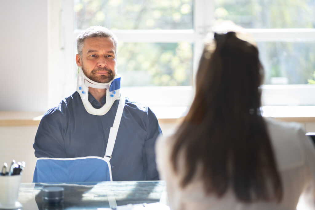 man with personal injury getting the help of a personal injury lawyer