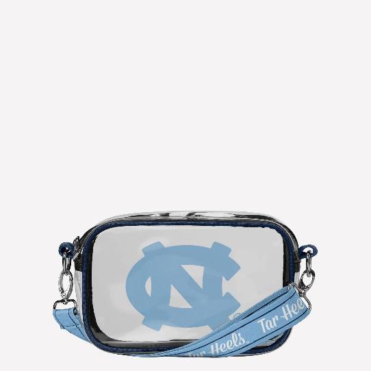 A clear bag with a blue strap

Description automatically generated