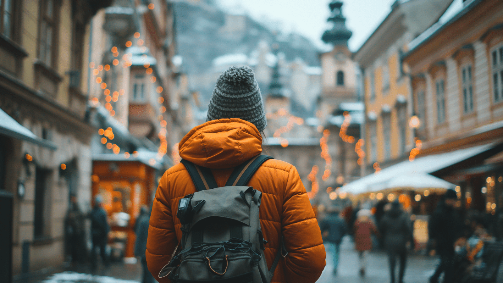 Traveler in a snowy European town, a magical part of 5 days in Central Europe