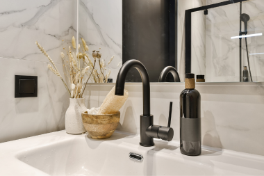 things to consider while designing your bathroom remodel matte black faucet finish custom built michigan