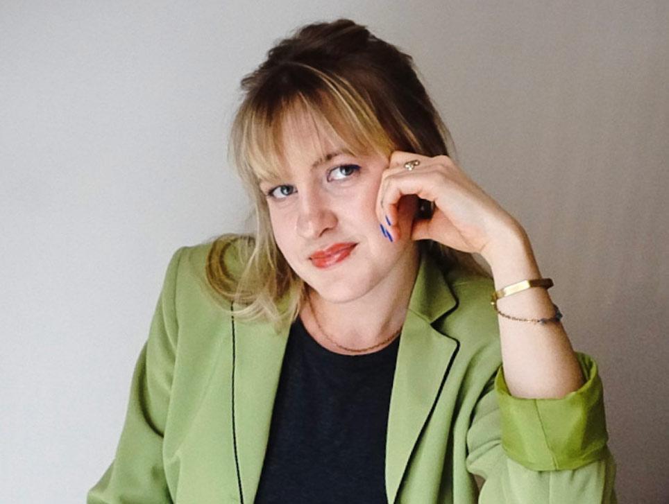 Image of the article author, wearing a green jacket against a white background. 