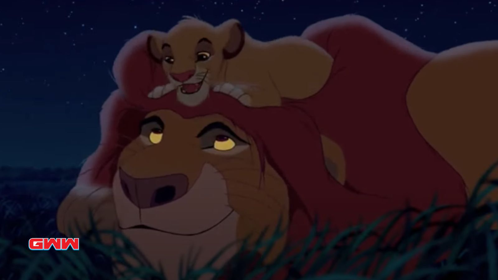 Mufasa dejando que Simba pase por encima de su cabeza para jugar con él.