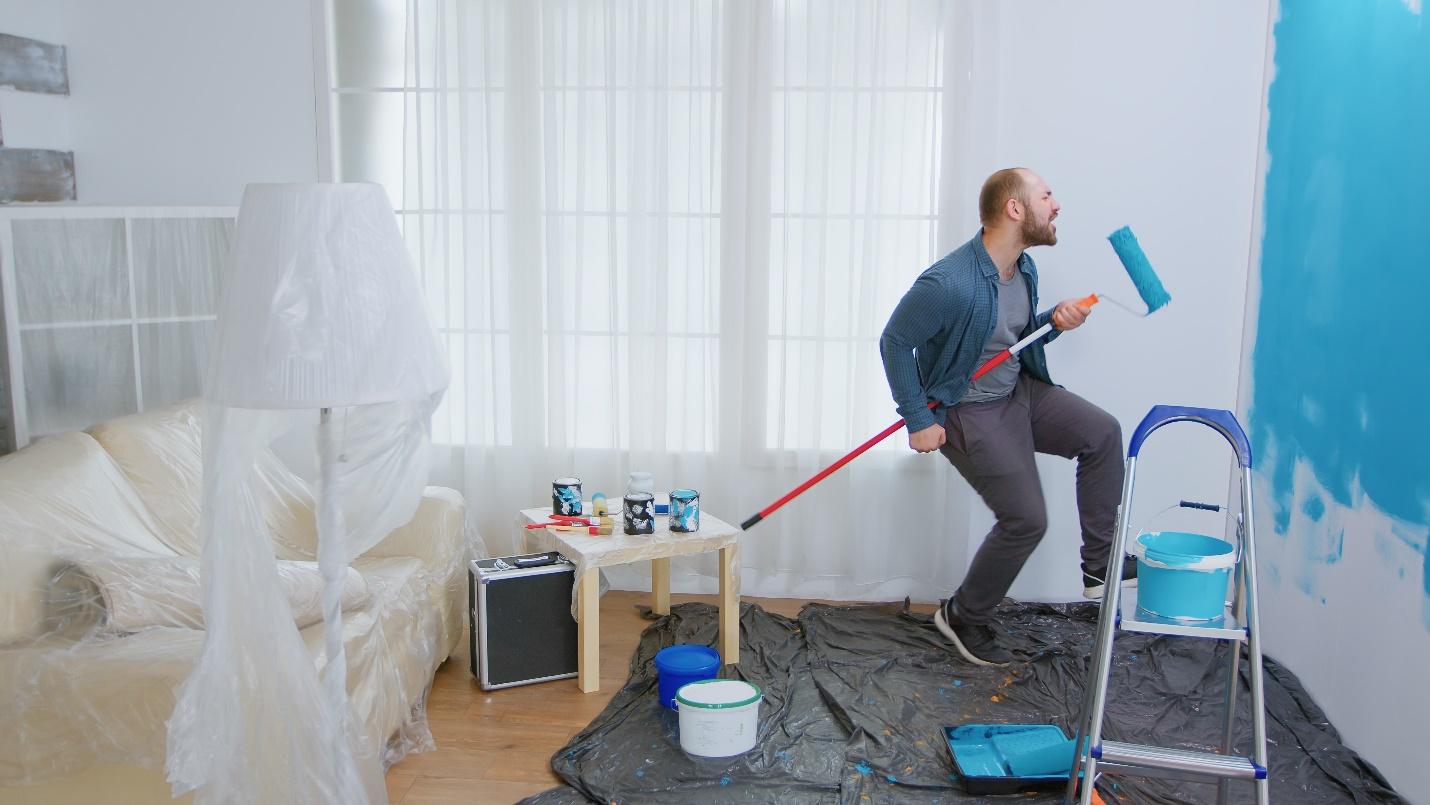 C:\Users\DELL\Downloads\repairman-during-home-construction-using-roller-brush-as-guitar-guy-singing-while-renovating-house-apartment-redecoration-home-construction-while-renovating-improving-repair-decorating.jpg