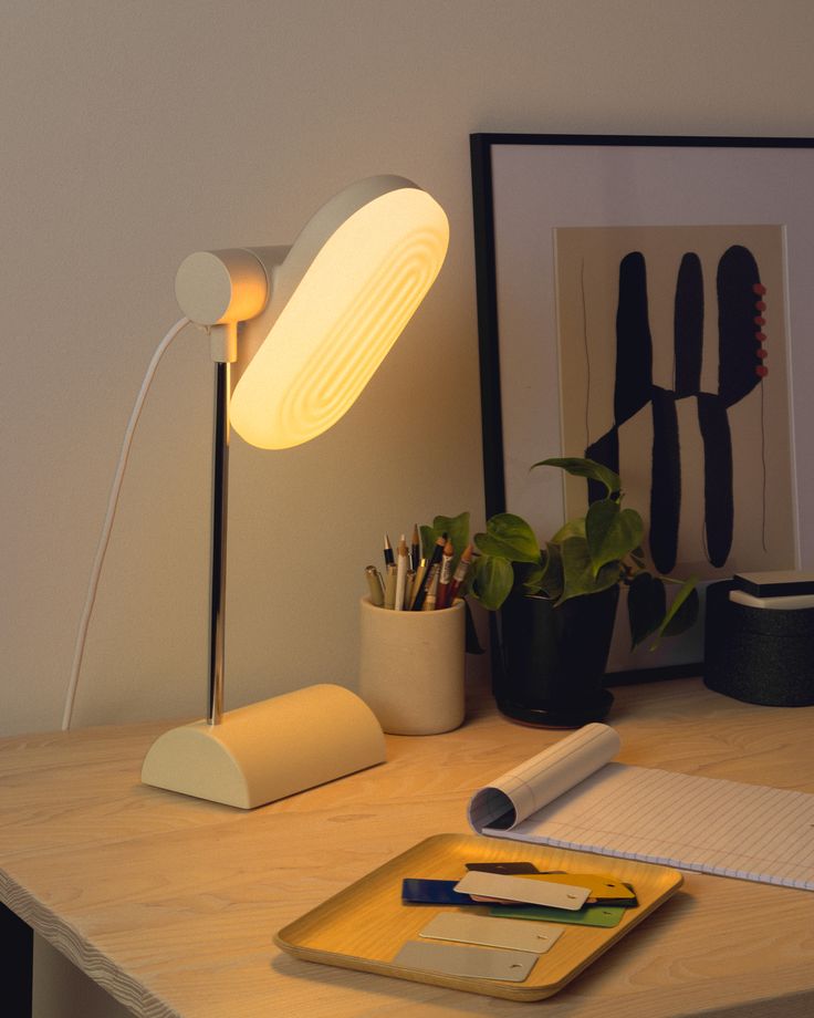 A desk lamp used as a source of task light in an interior space - Lighting in Architecture - image 2