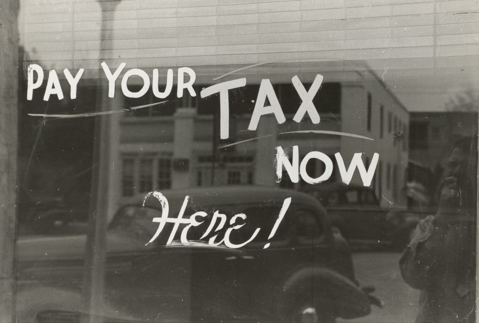 Pay your tax now. Photo by The New York Public Library on Unsplash