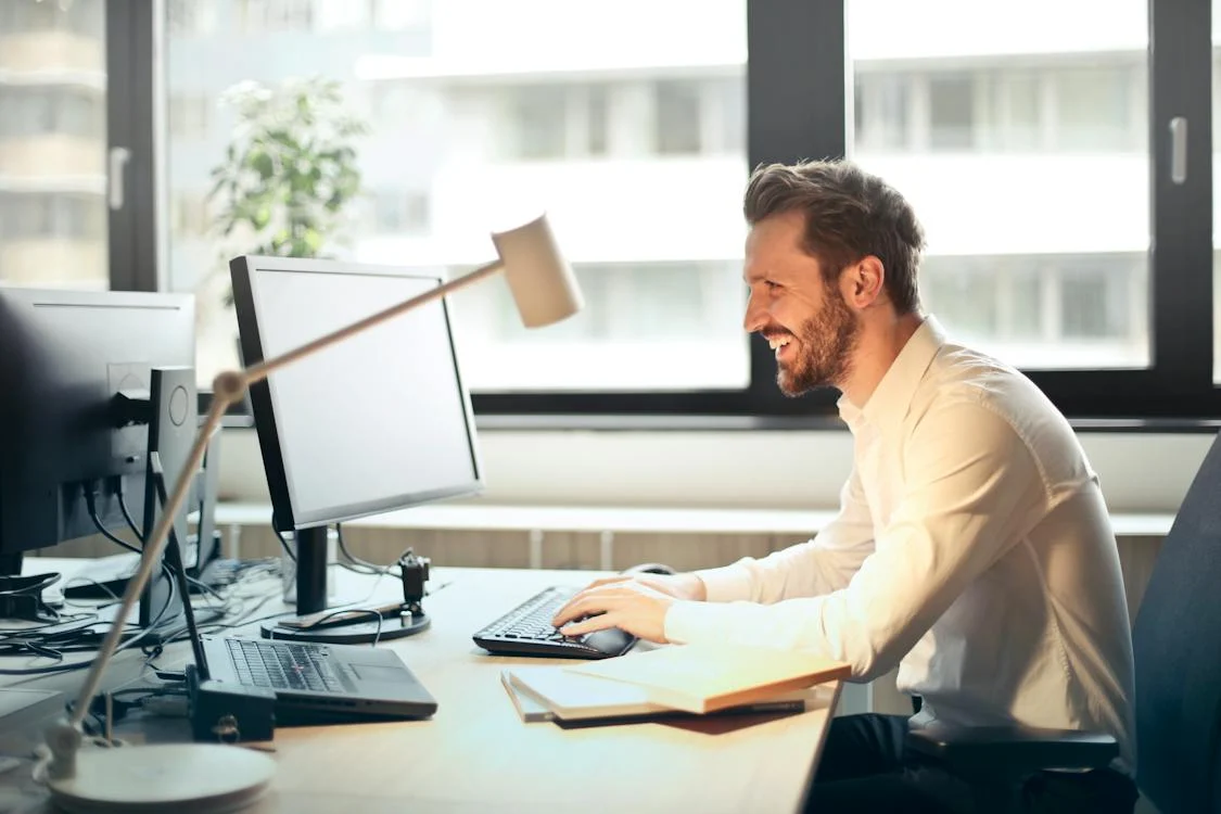 person on computer