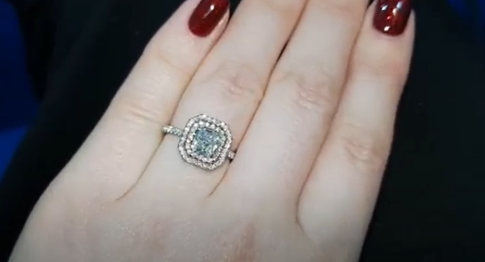 1.07 carat blue diamond in double pink diamond