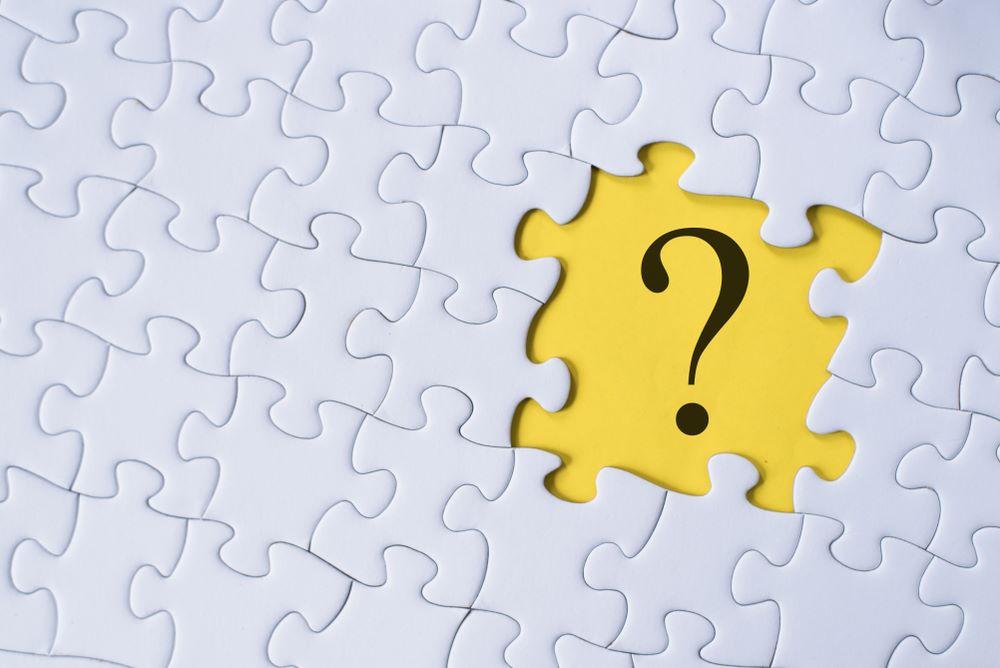 A question mark on a jigsaw puzzle