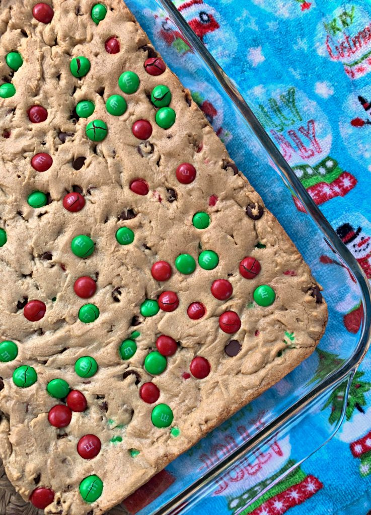 christmas M&M cookie bars in glass dish
