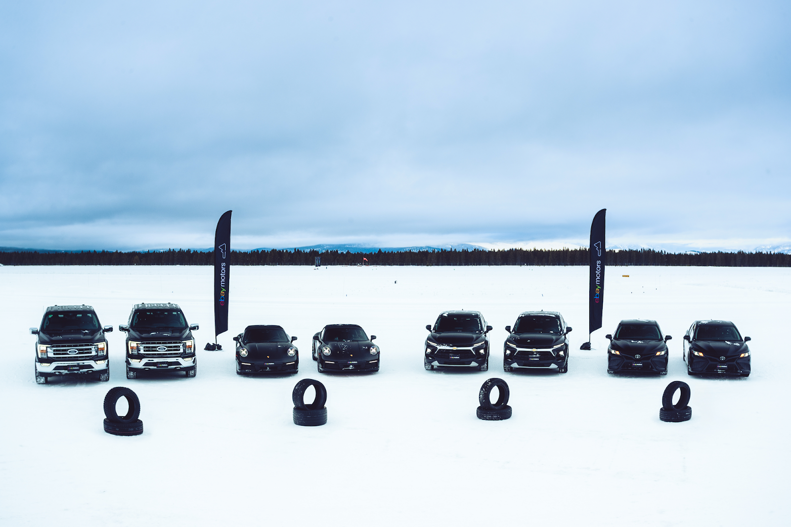 Cars and trucks on a frozen lake