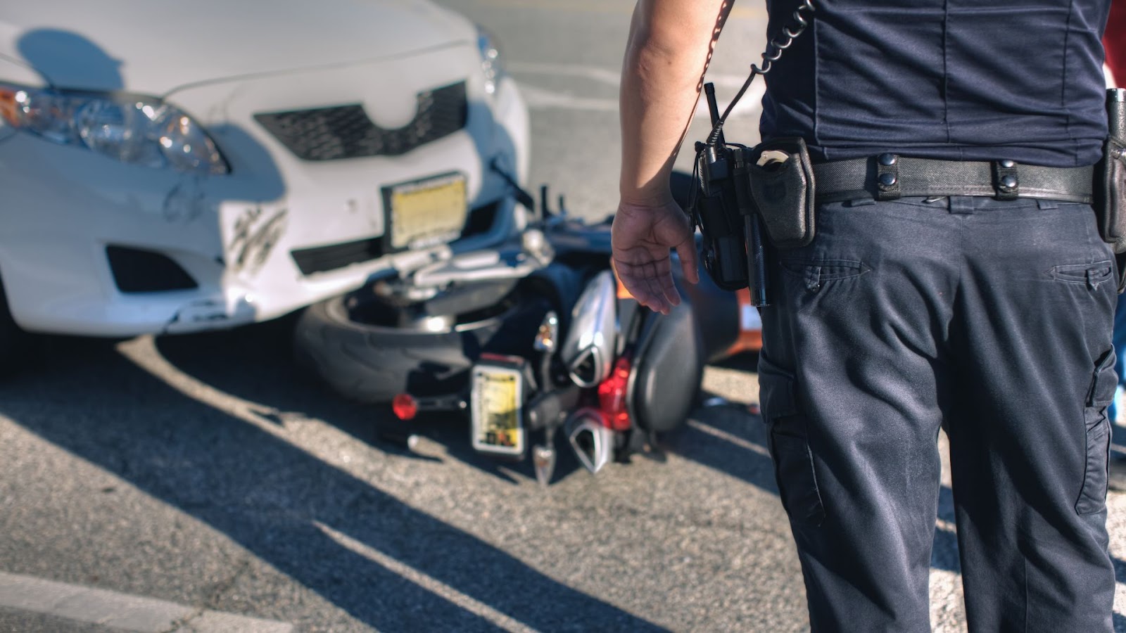 police officer at a car crash scene